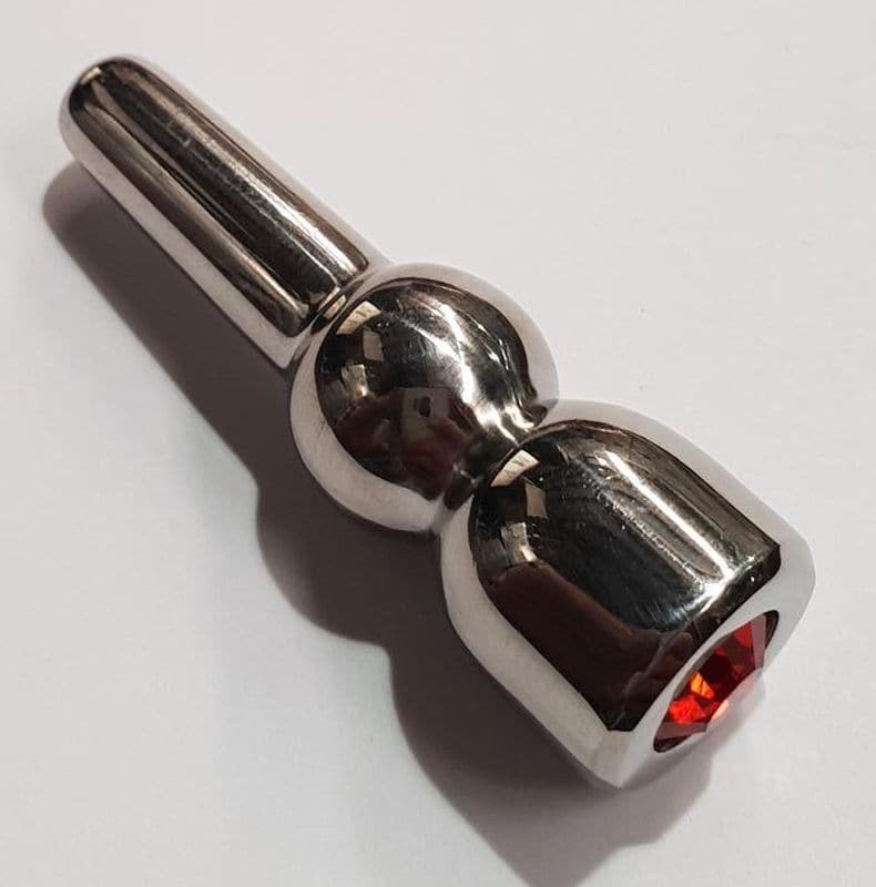 Glowstick Jewelled Ascending Penis Plug Ruby Gemmed